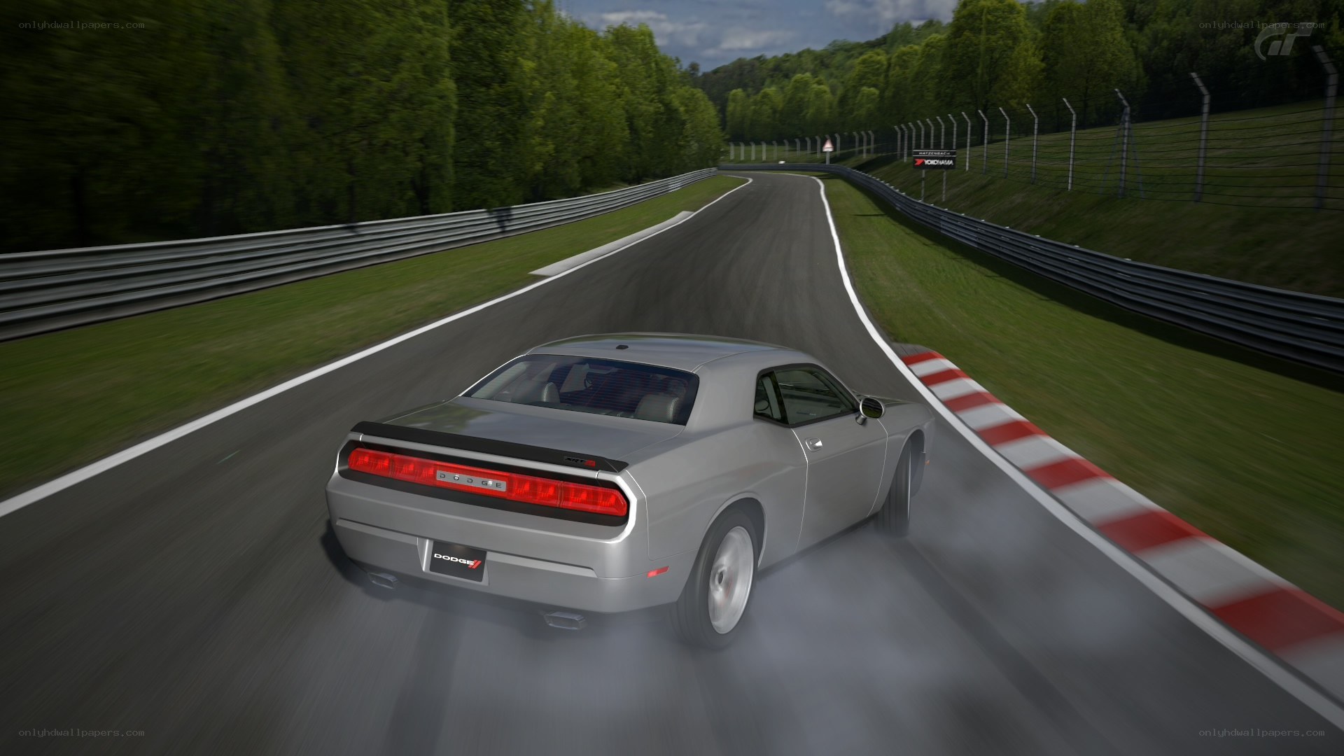 Silver Dodge Challenger on racetrack