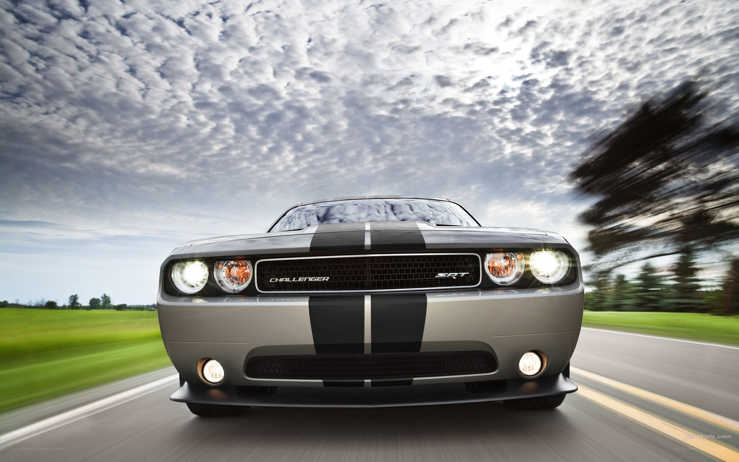 Silver Dodge Challenger SRT in motion