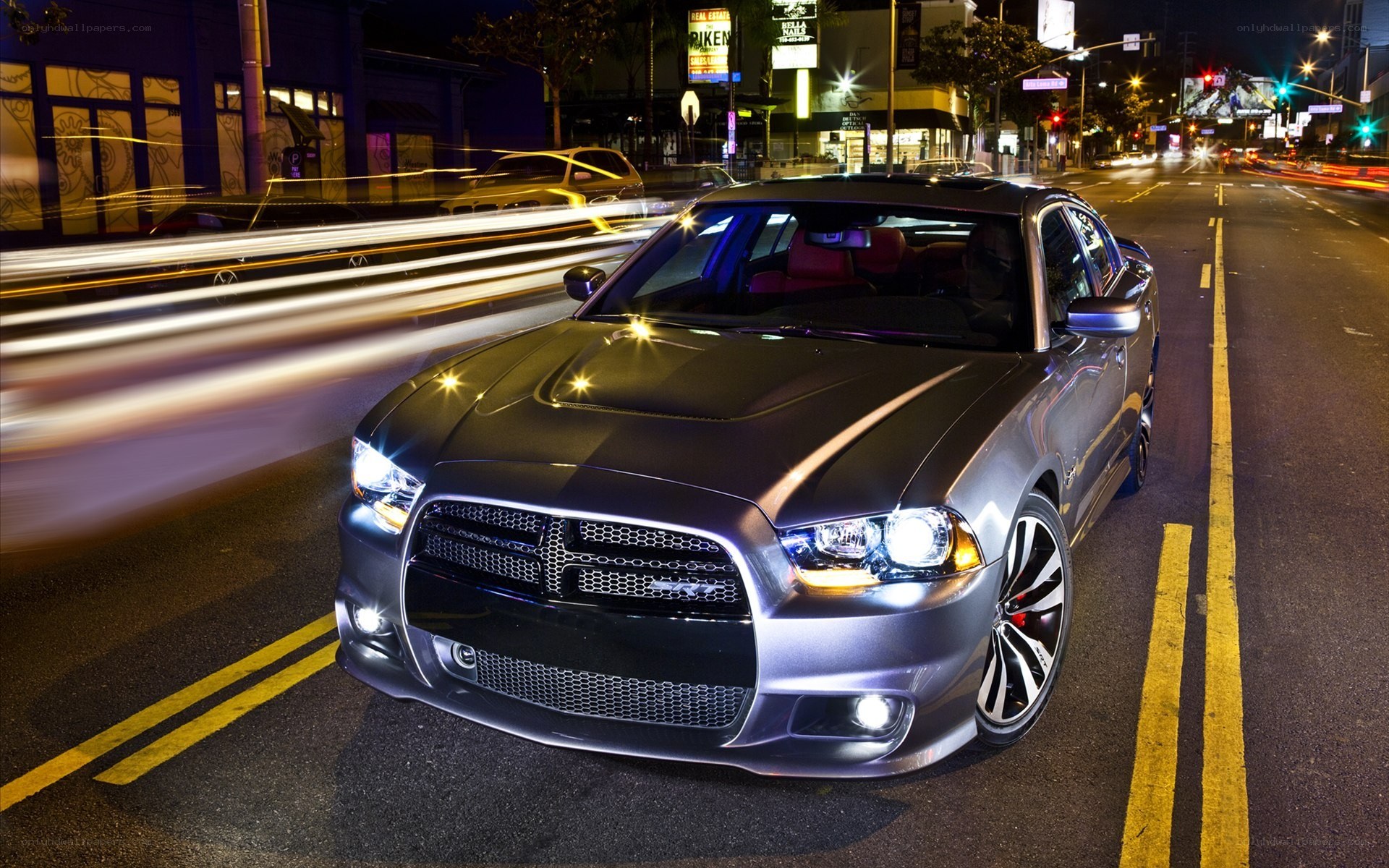 Silver Dodge Charger at night