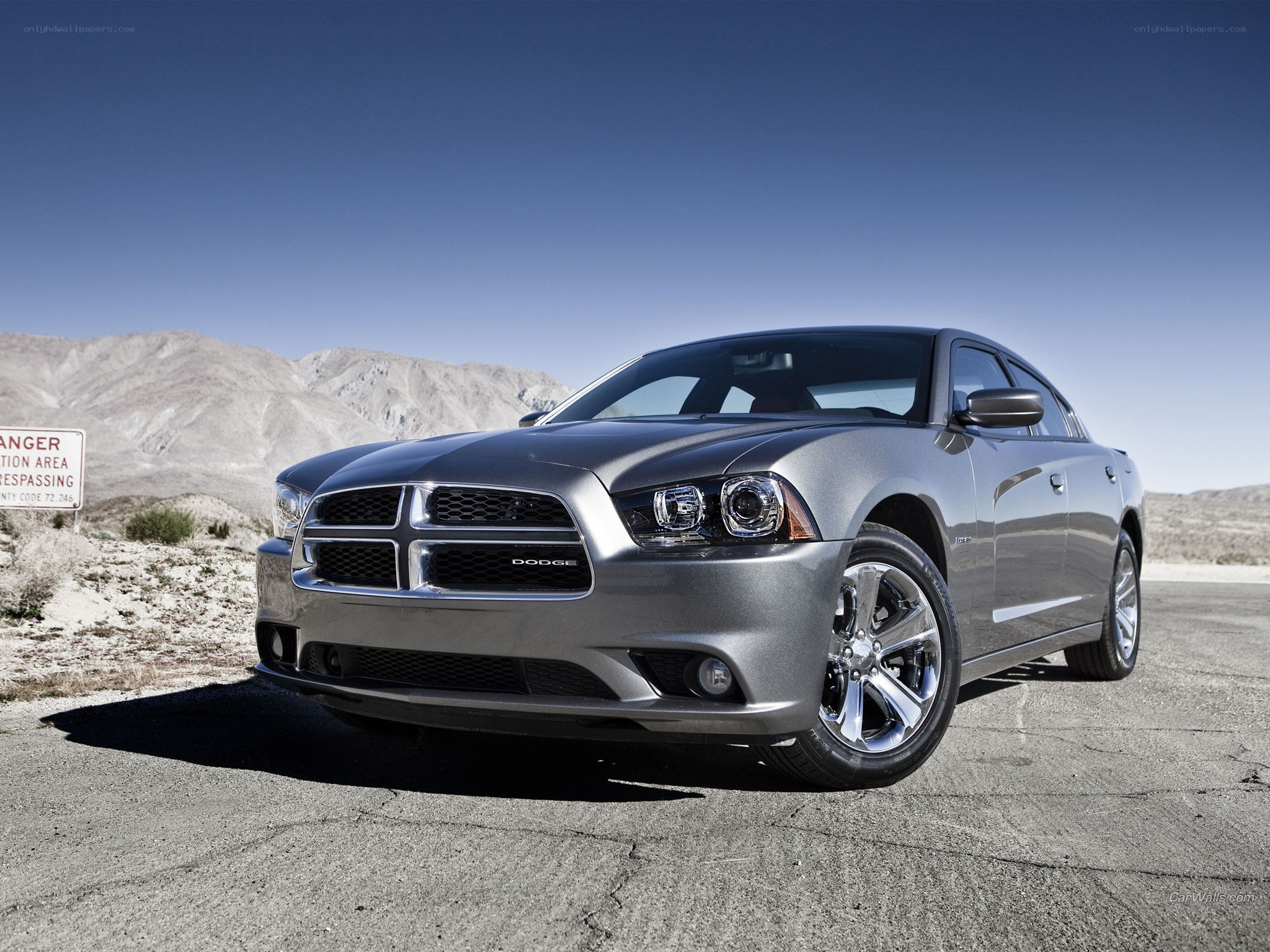 silver dodge charger in desert
