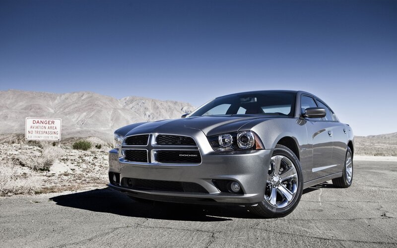 Silver Dodge Charger in desert