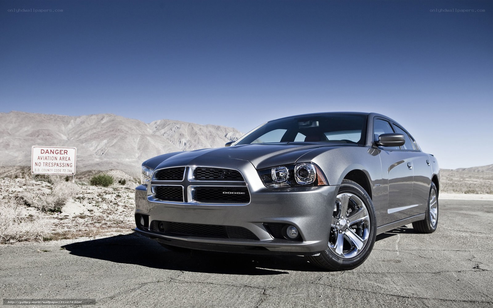 Silver Dodge Charger in desert