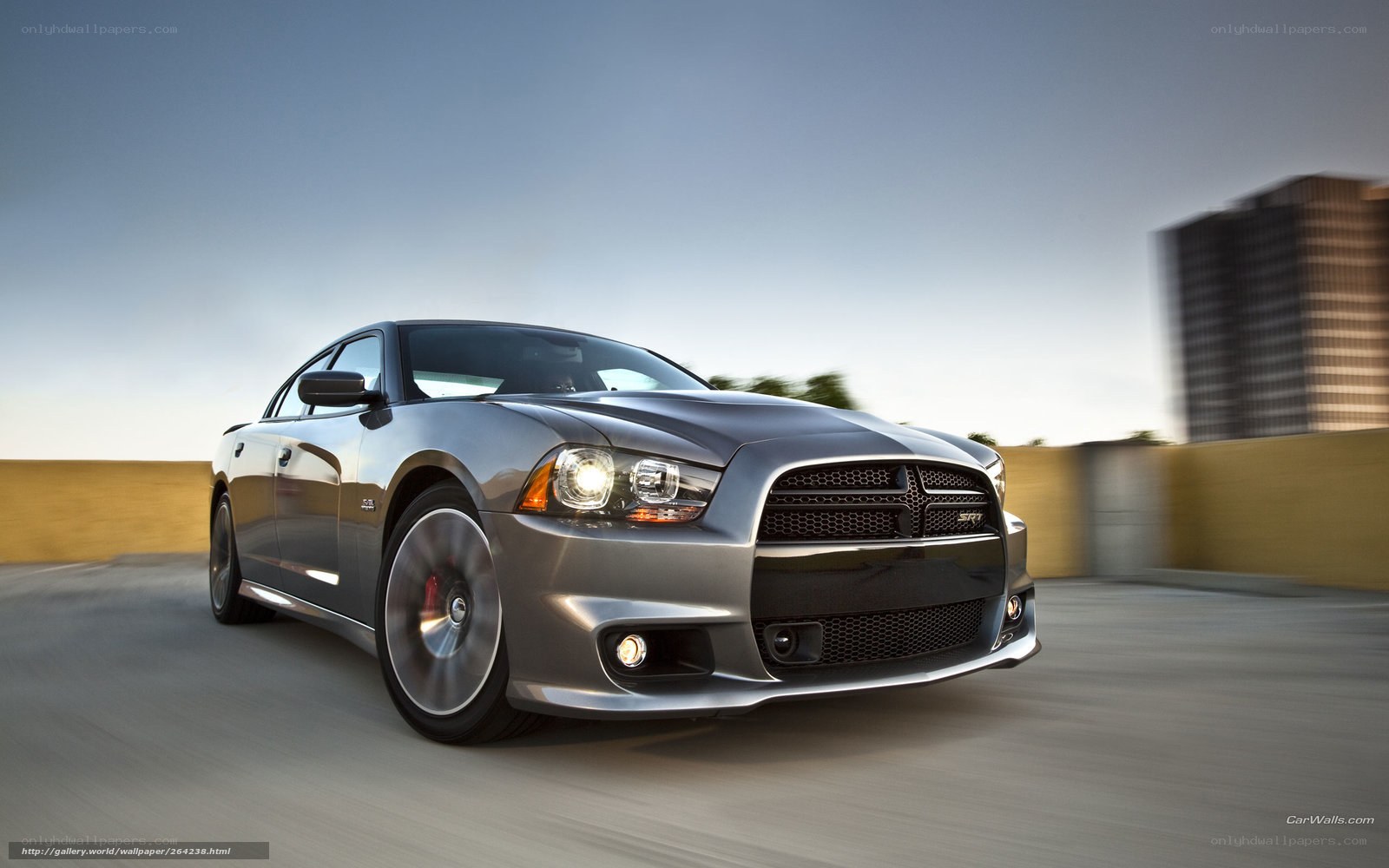 silver dodge charger in motion