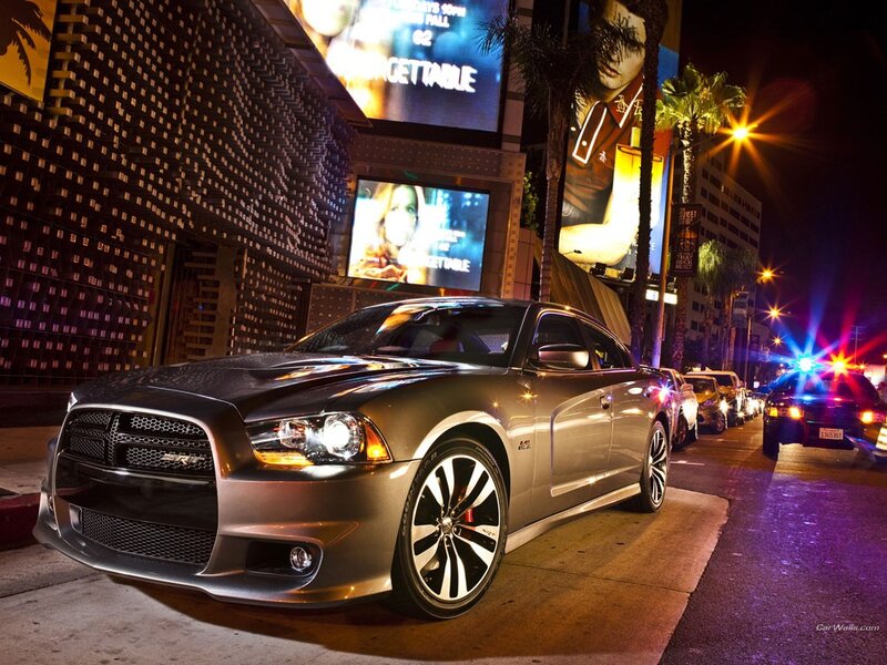 Silver Dodge Charger on city street