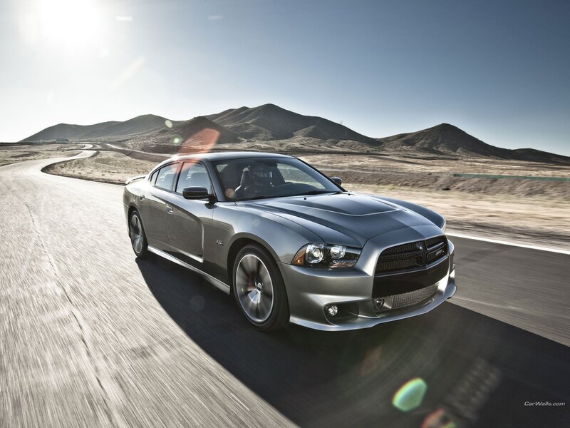 silver dodge charger on desert road