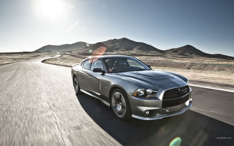 silver dodge charger on desert road