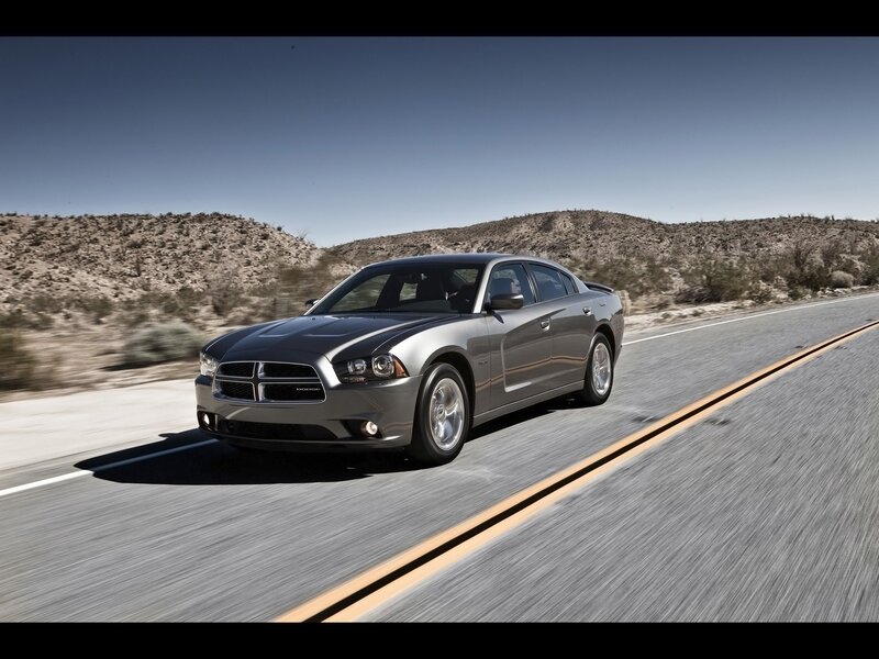 silver dodge charger on desert road