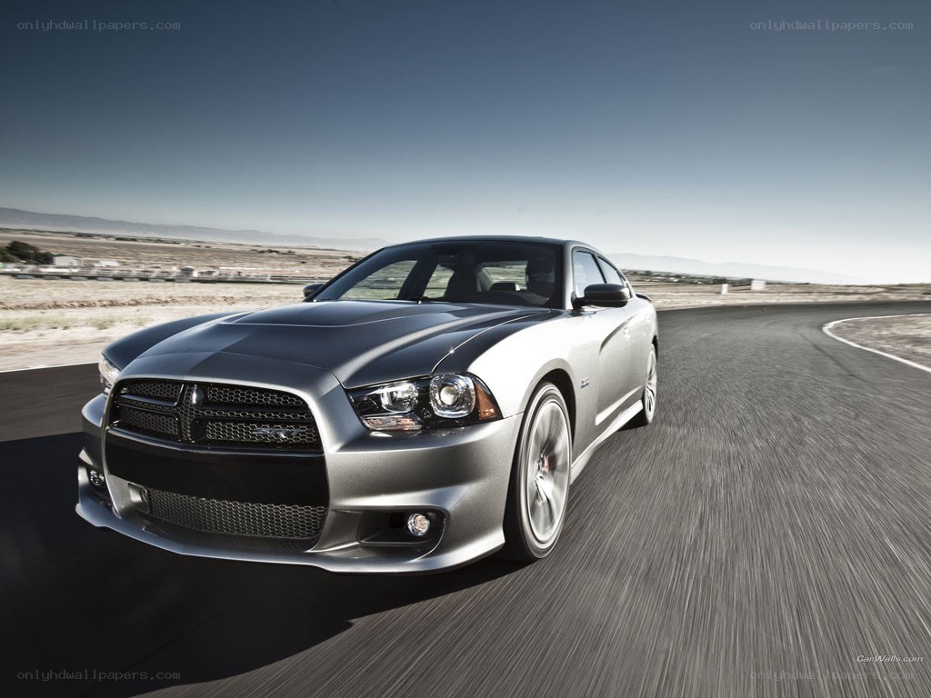 silver dodge charger on track