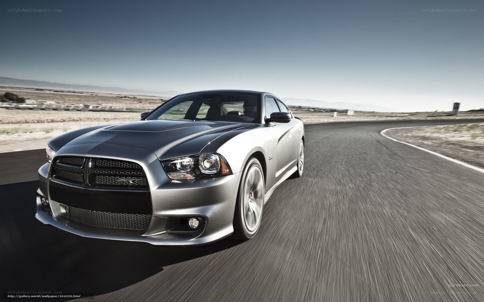 silver dodge charger on track