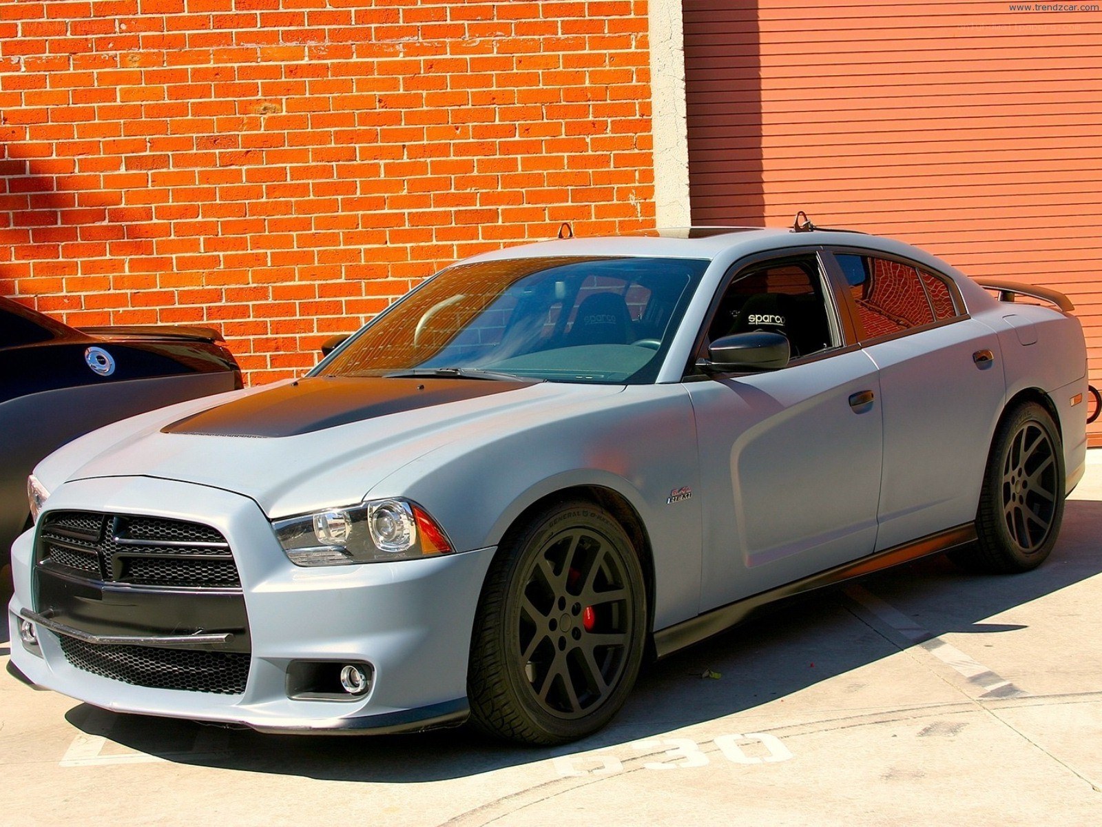 silver dodge charger parked