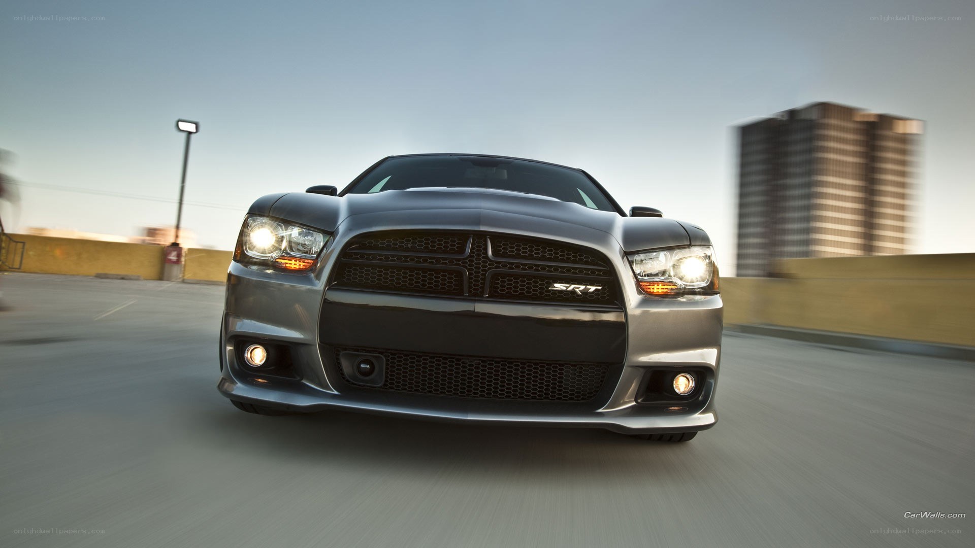 silver dodge charger srt in motion