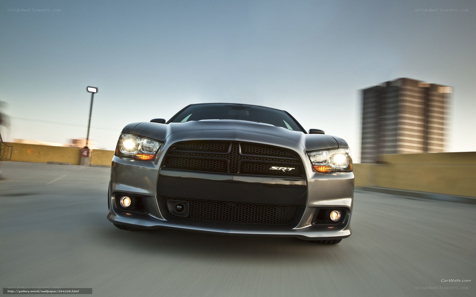 silver dodge charger srt in motion