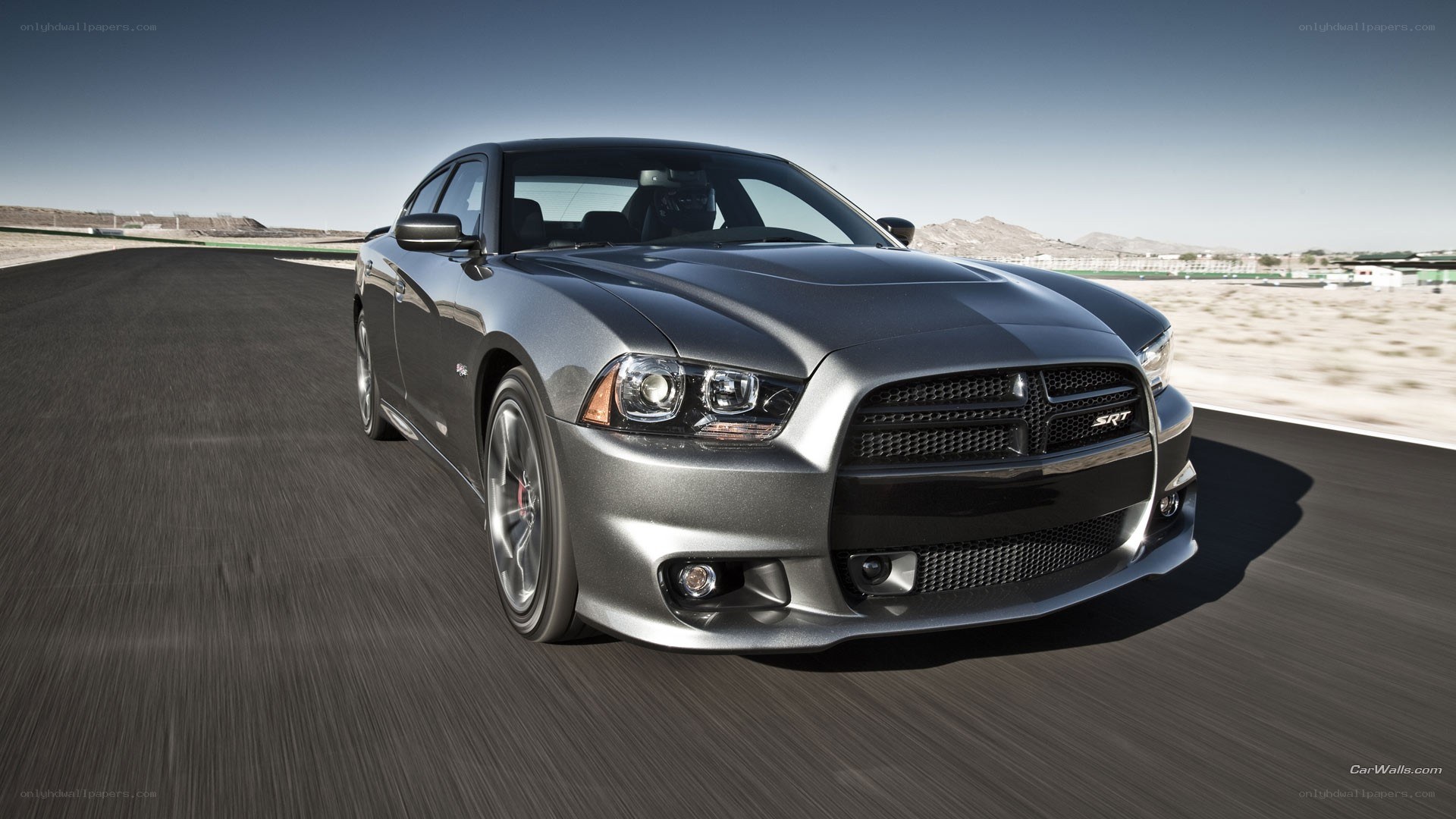 silver dodge charger srt on track