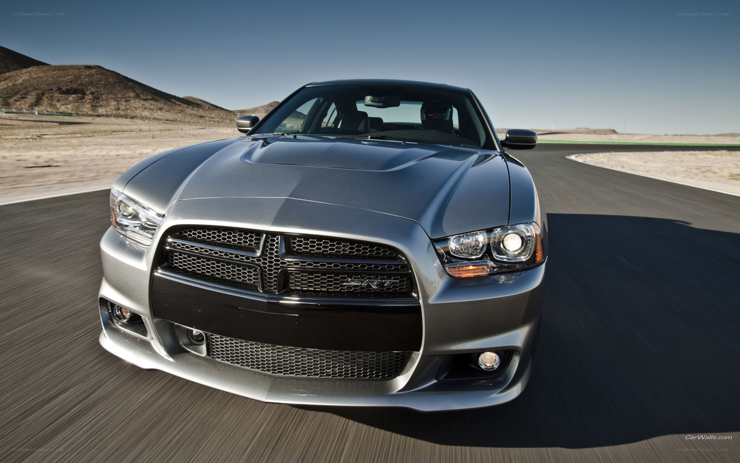 silver dodge charger srt on track