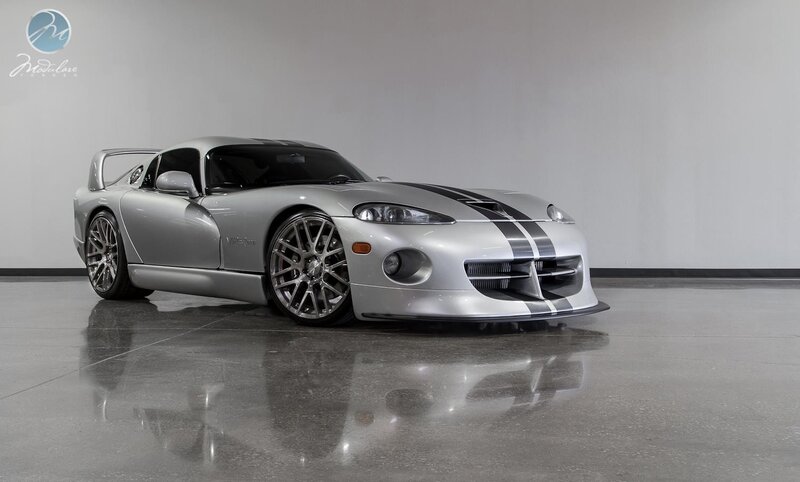 Silver Dodge Viper with stripes