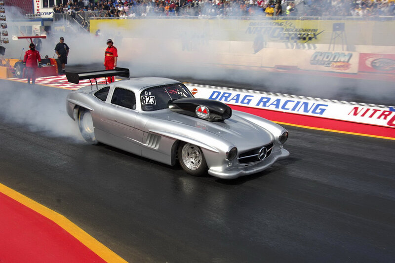 Silver drag racing car at the starting line