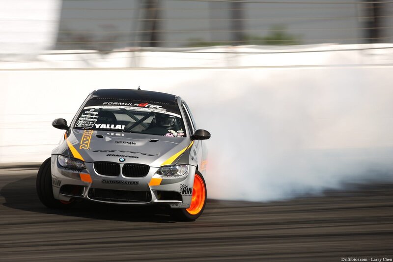 silver drift car in action