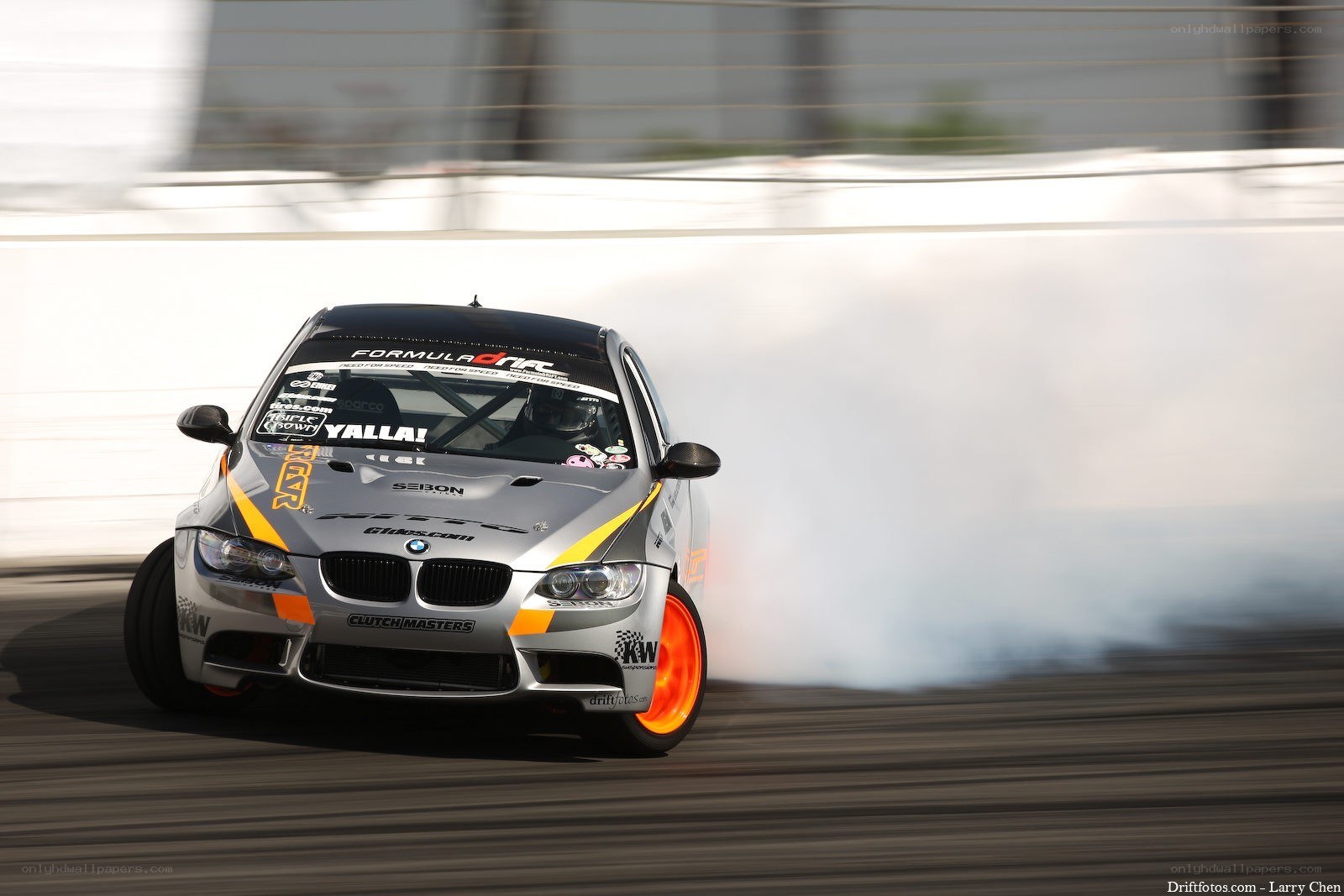 silver drift car in action
