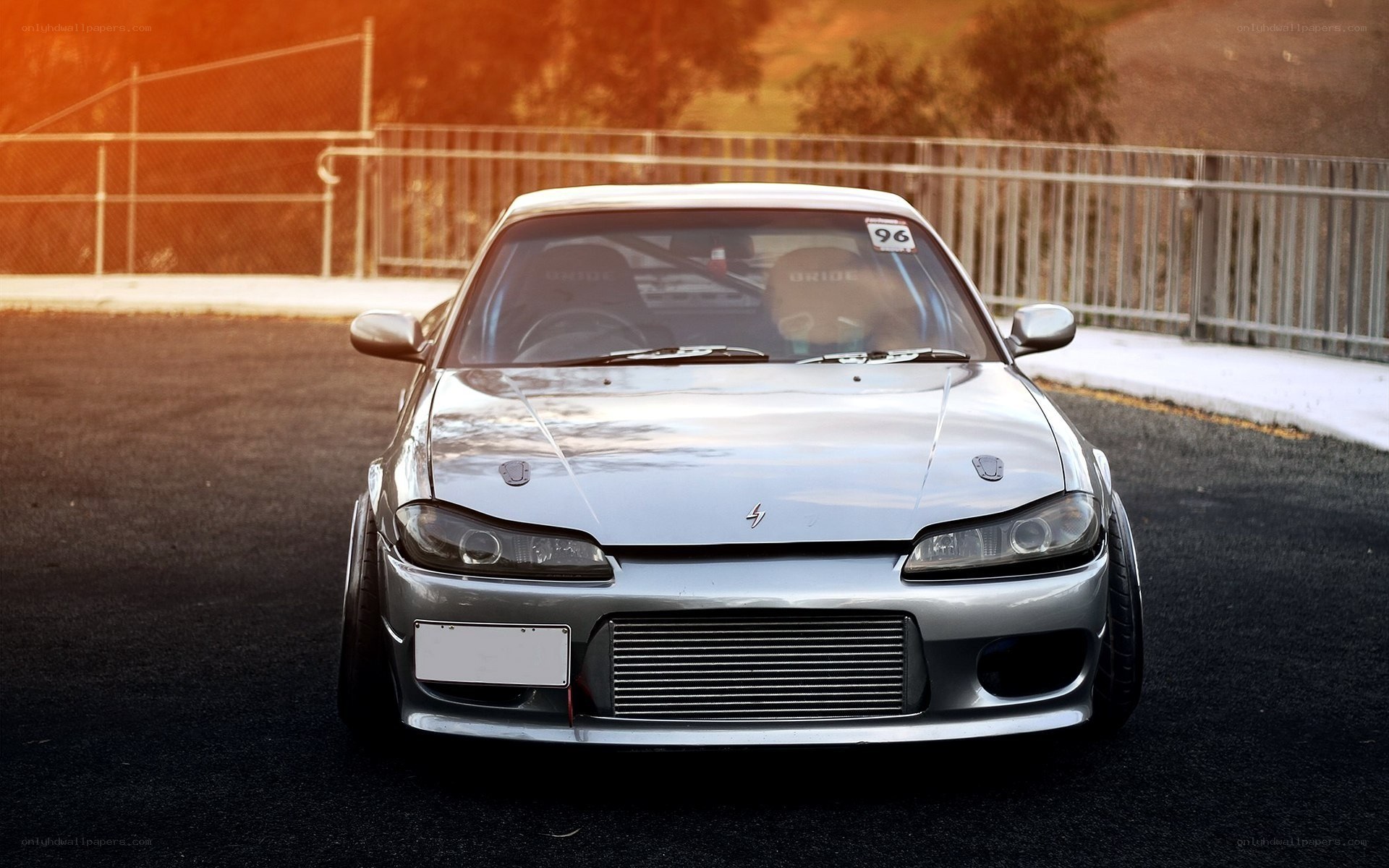 silver drift car on track