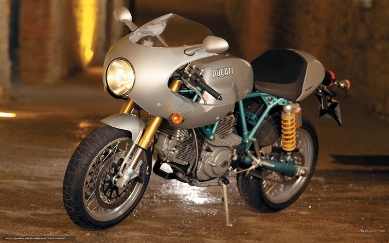 Silver Ducati Motorcycle — Dramatic, Night