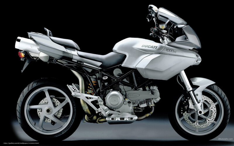 Silver Ducati Motorcycle — Dramatic, Photograph, Seat