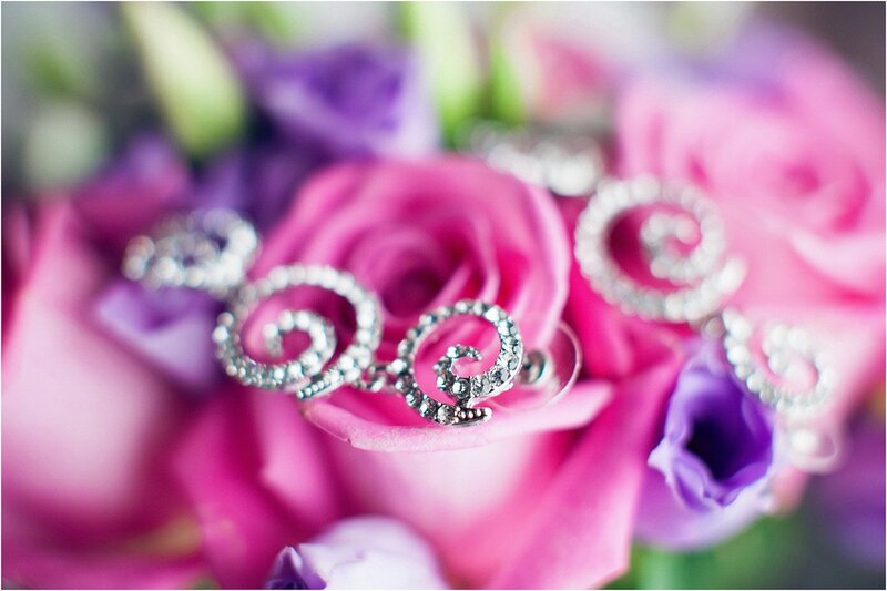 Silver Earrings on Flowers