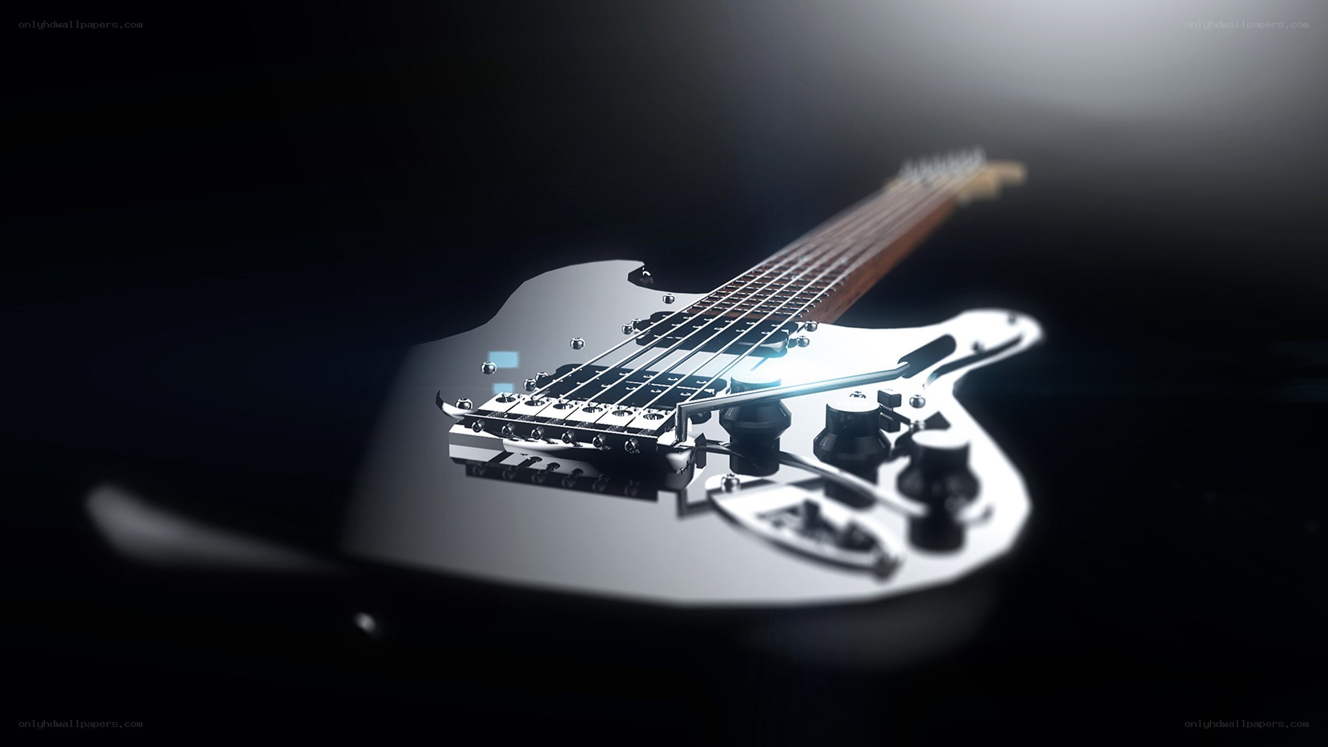 silver electric bass guitar