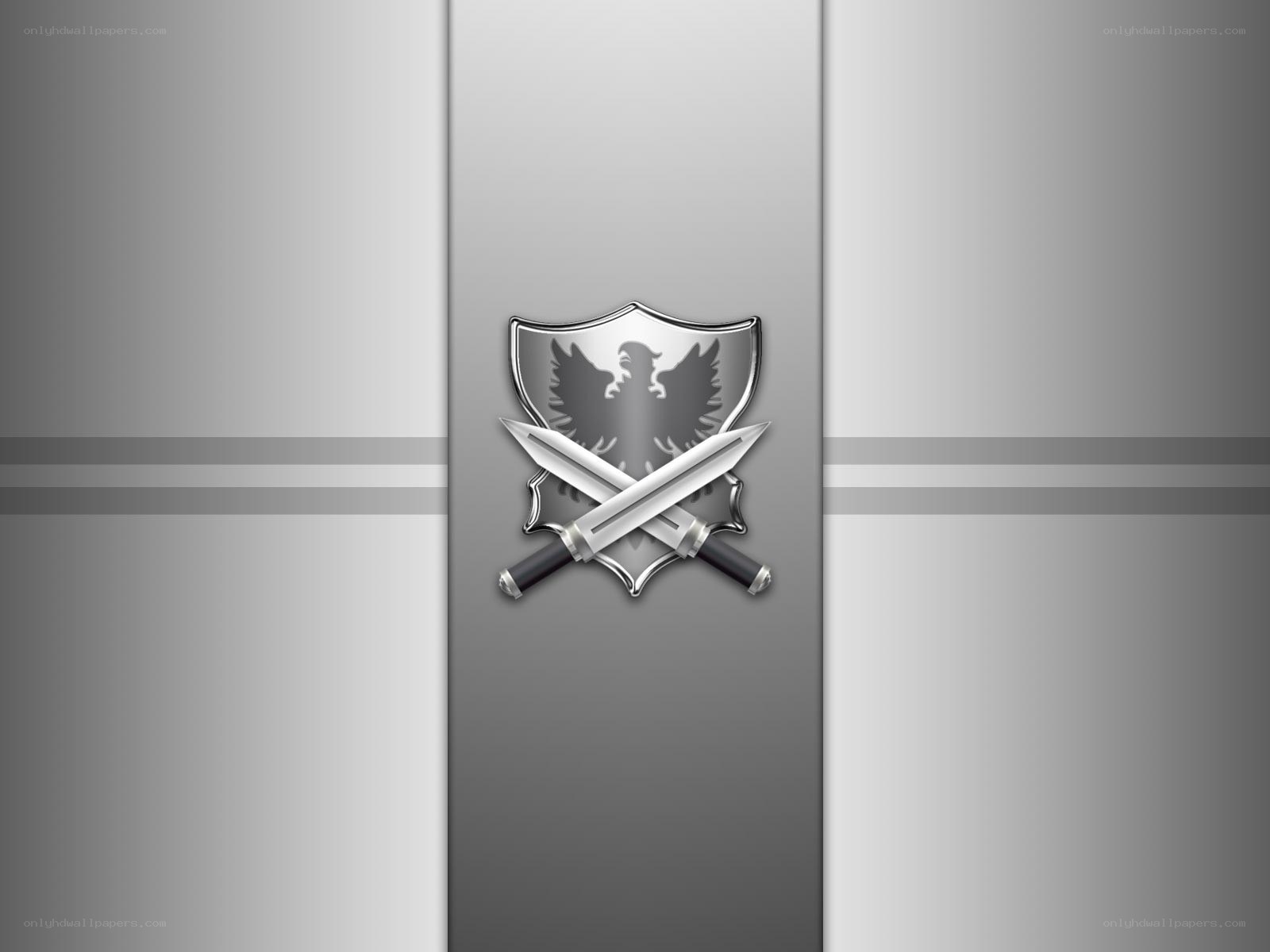 silver emblem with shield and swords