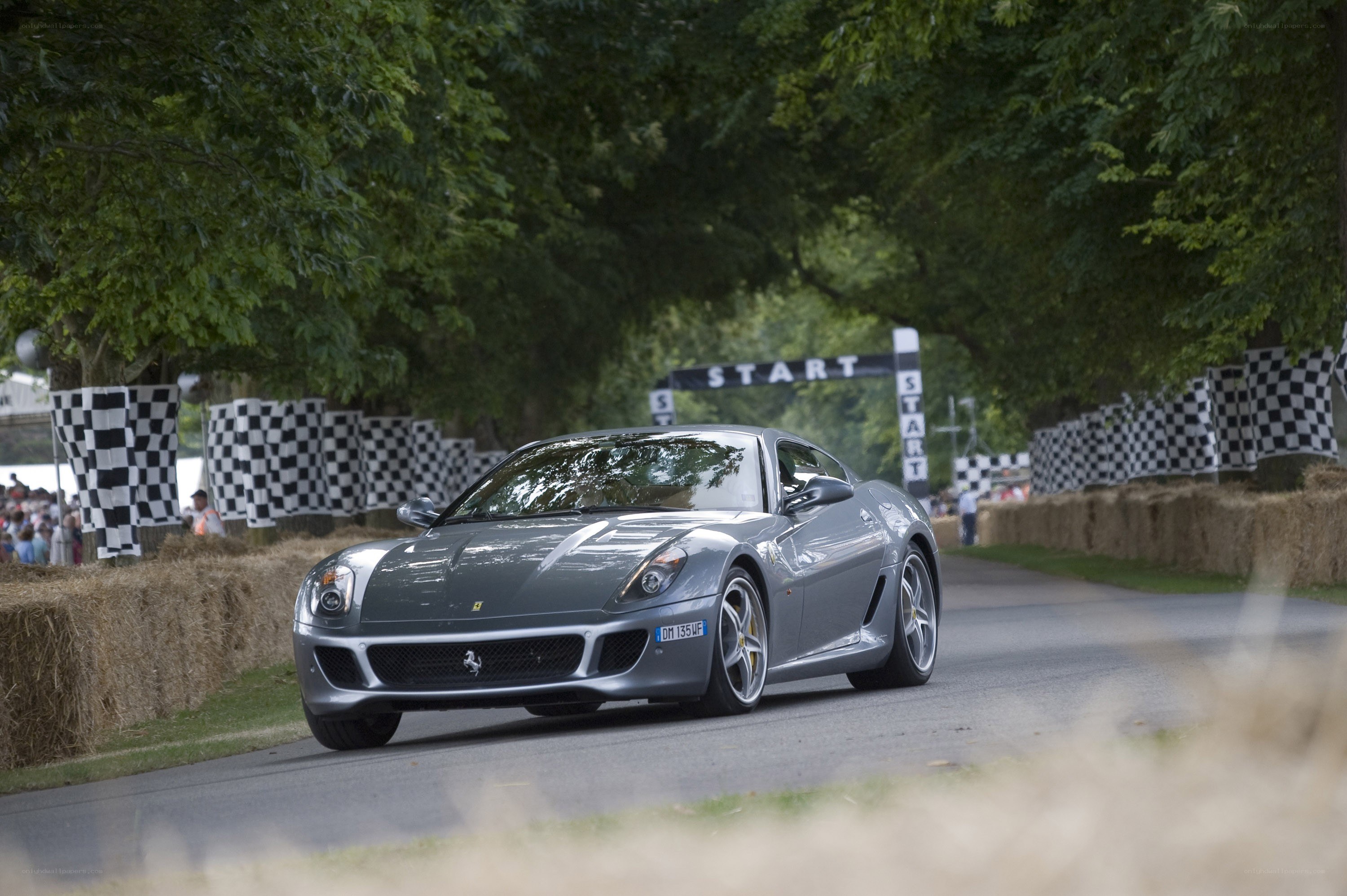 Silver Ferrari at start line
