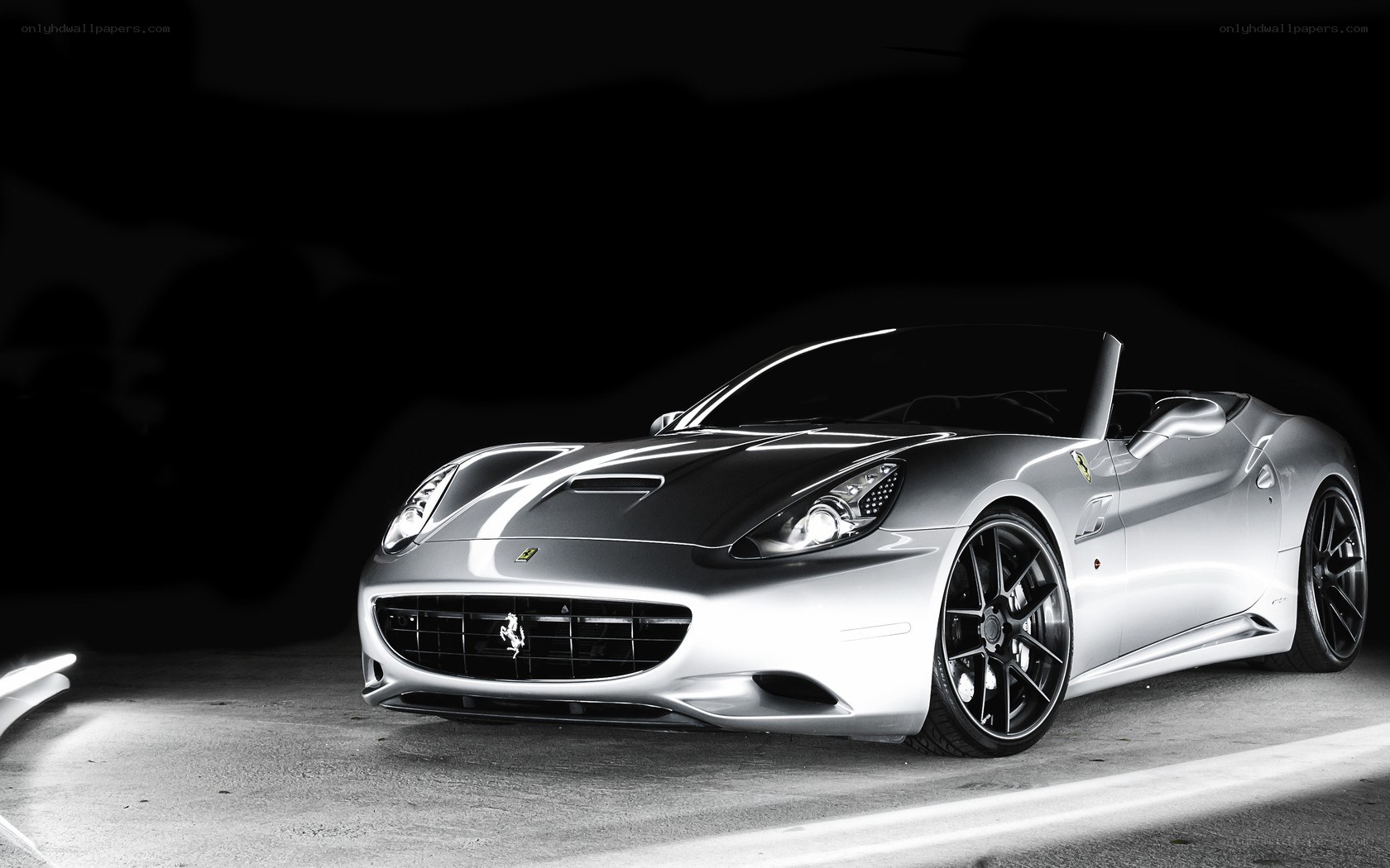 silver ferrari convertible