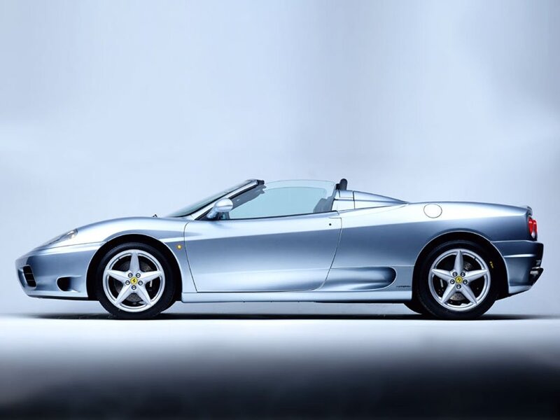 silver ferrari convertible