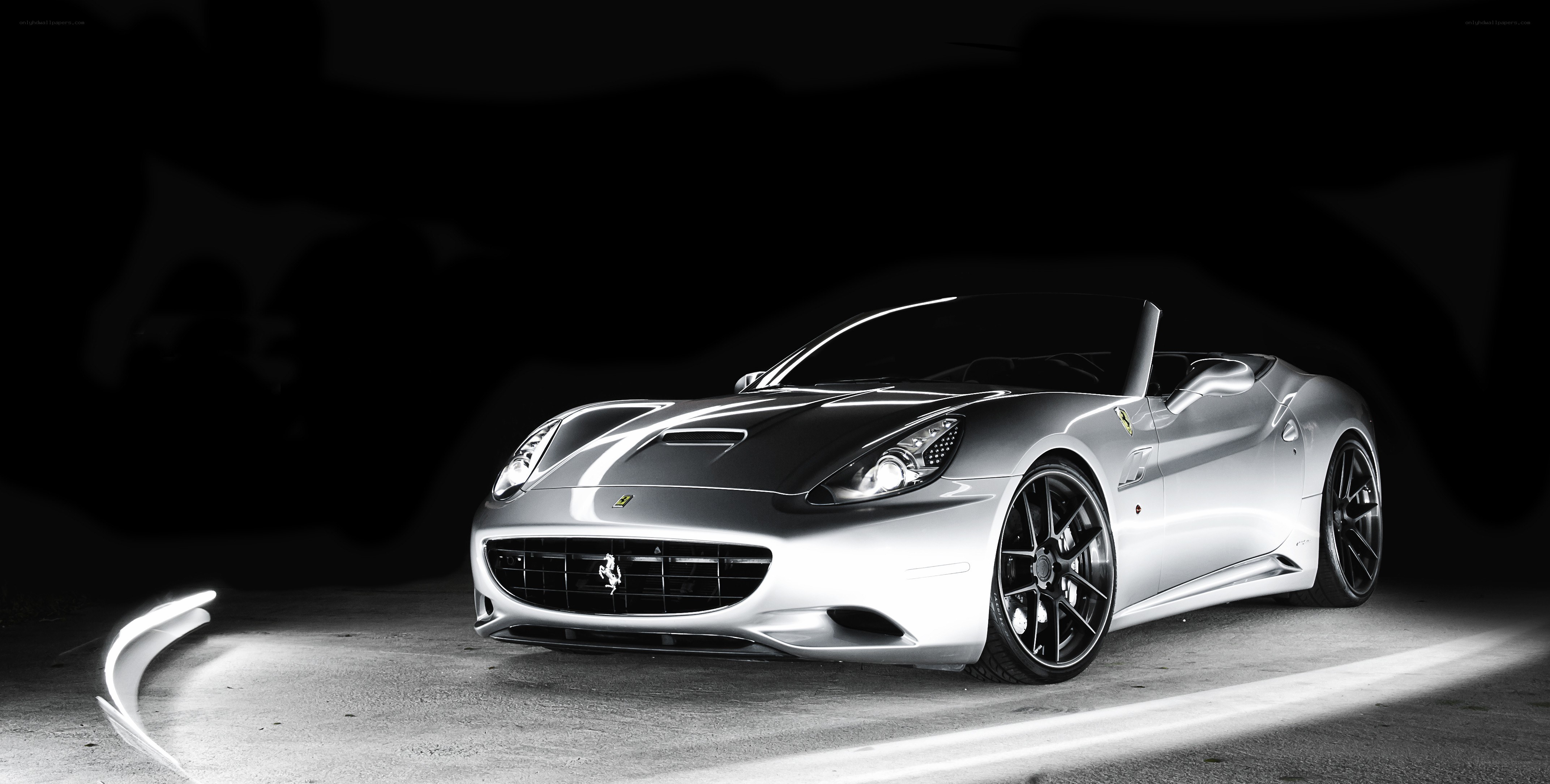 Silver Ferrari convertible car