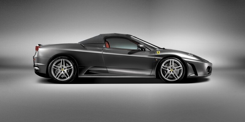 silver ferrari convertible sports car