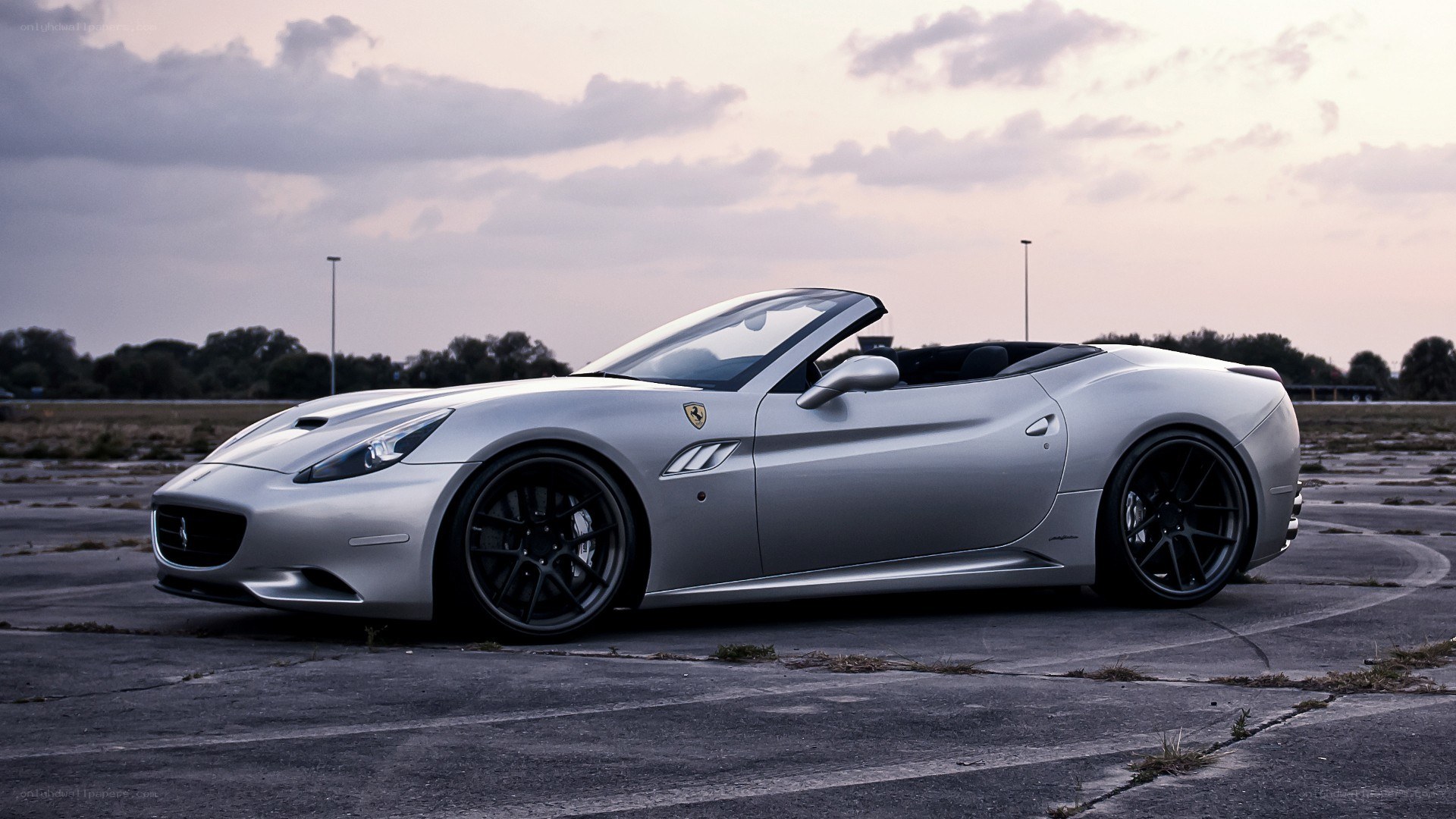 silver ferrari convertible