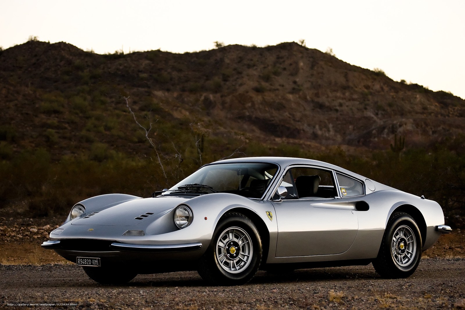 Silver Ferrari Dino in desert