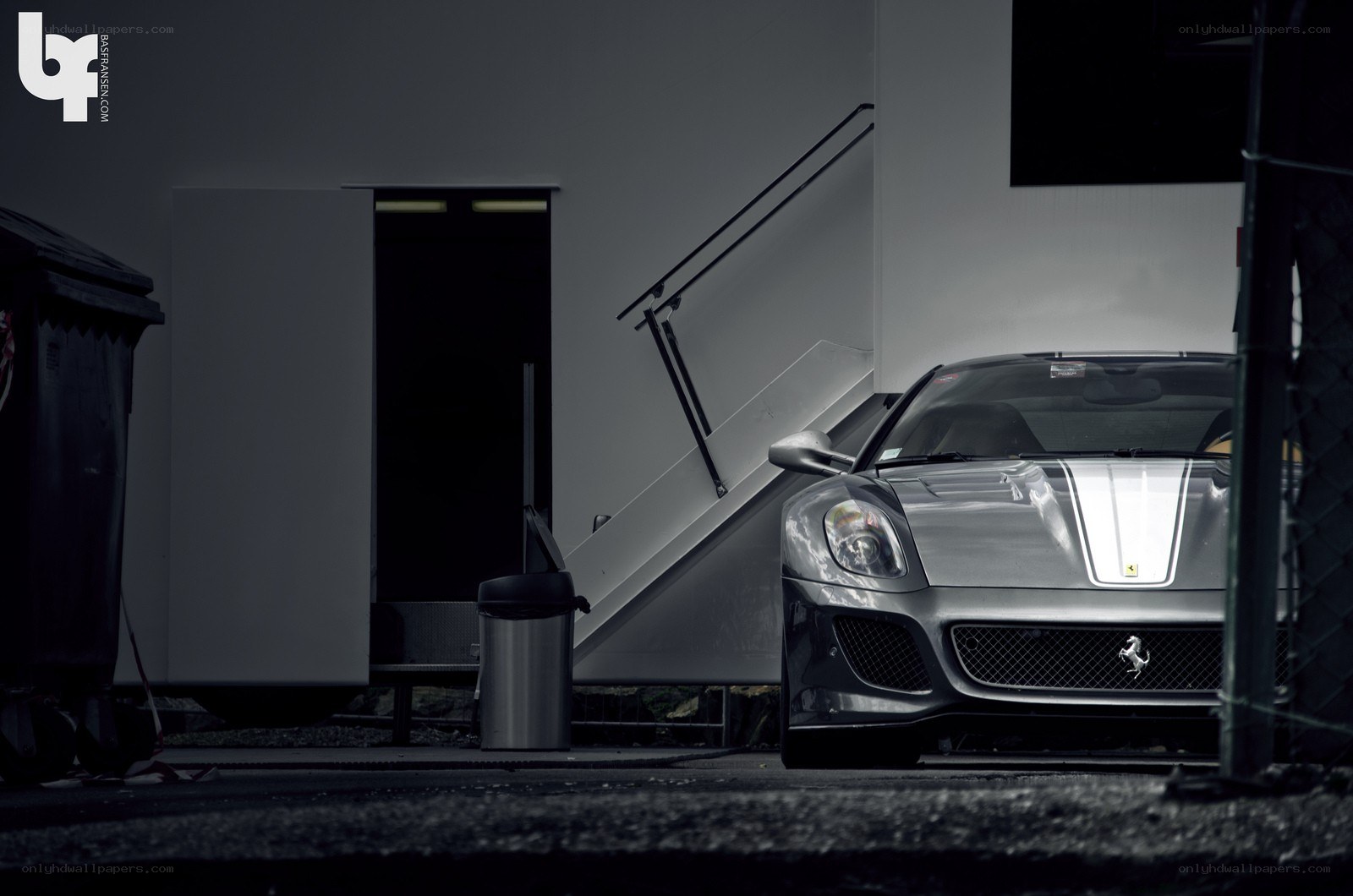 Silver Ferrari in a garage
