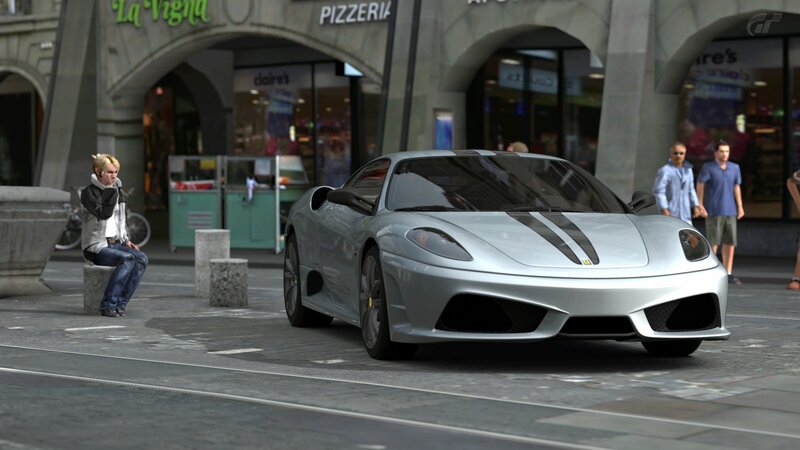 Silver Ferrari in city street
