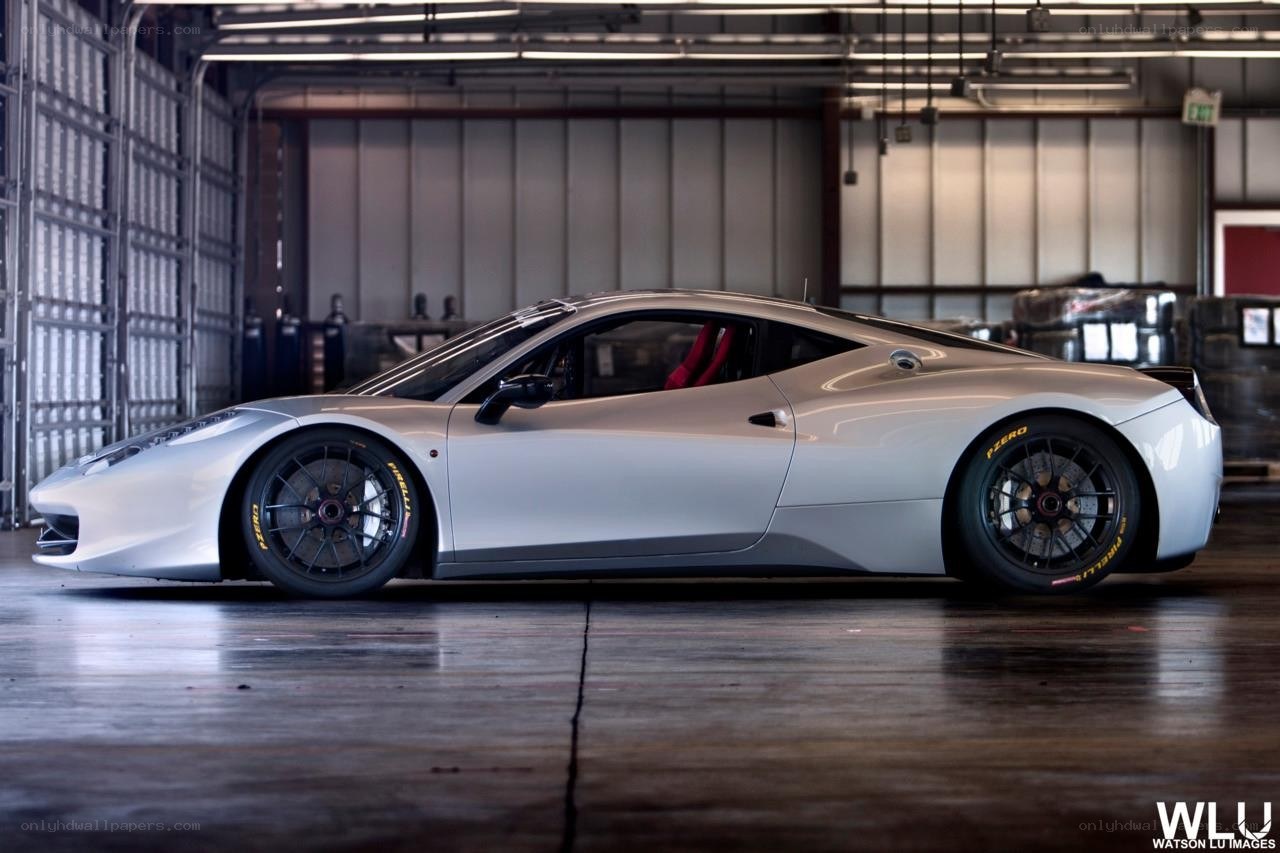 silver ferrari in garage
