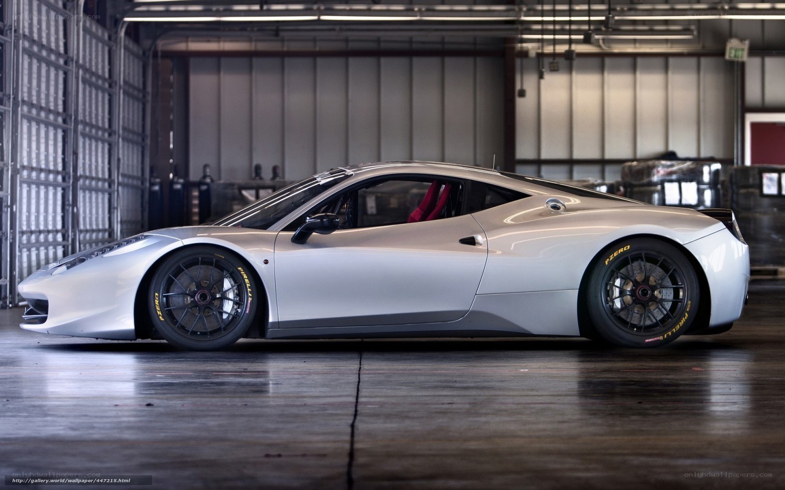 silver ferrari in garage