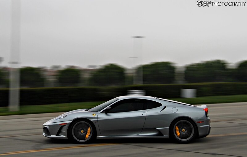 silver ferrari in motion