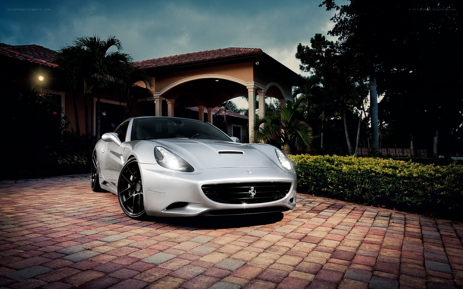 Silver Ferrari on a driveway