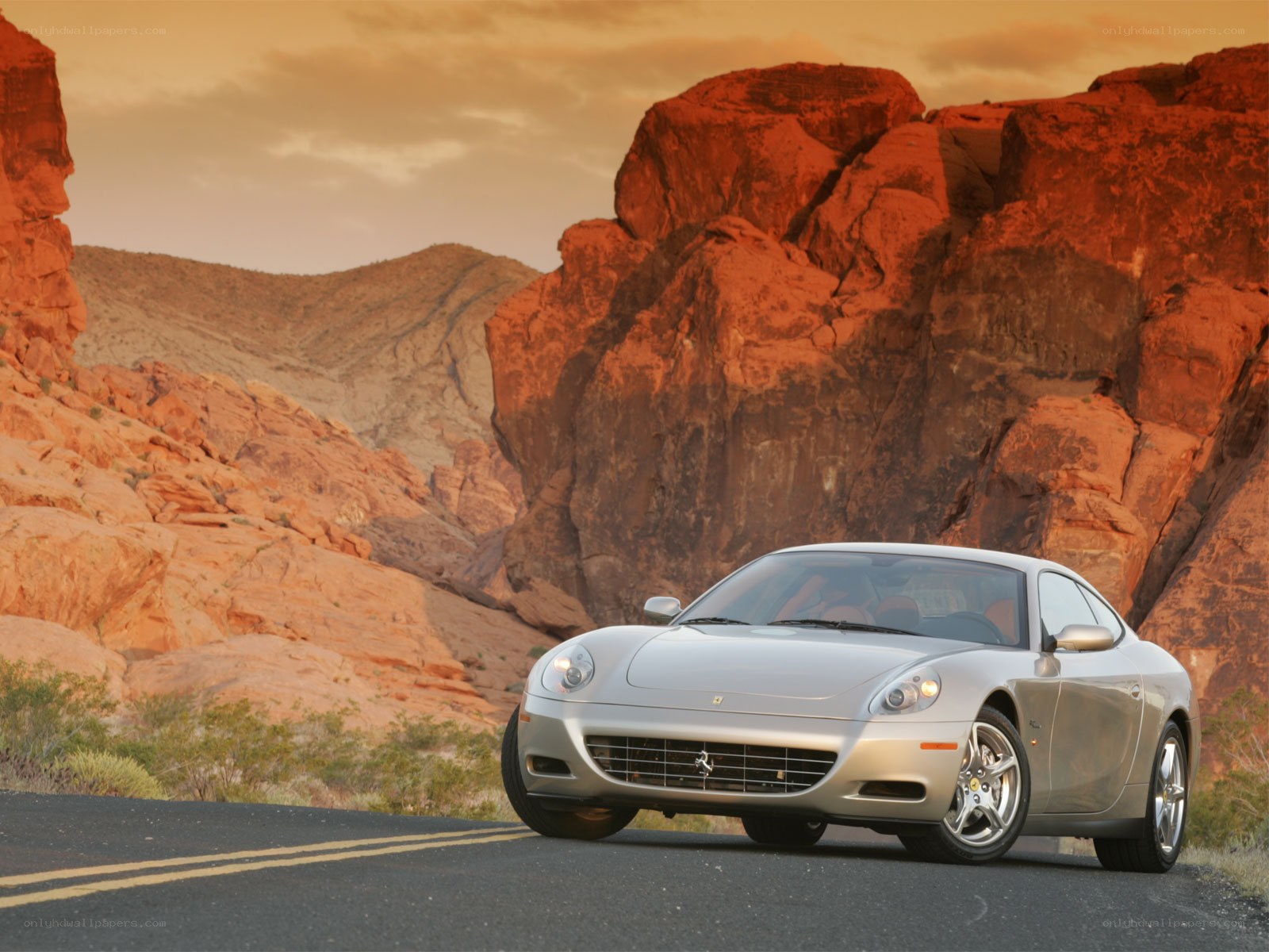 Silver Ferrari on desert road