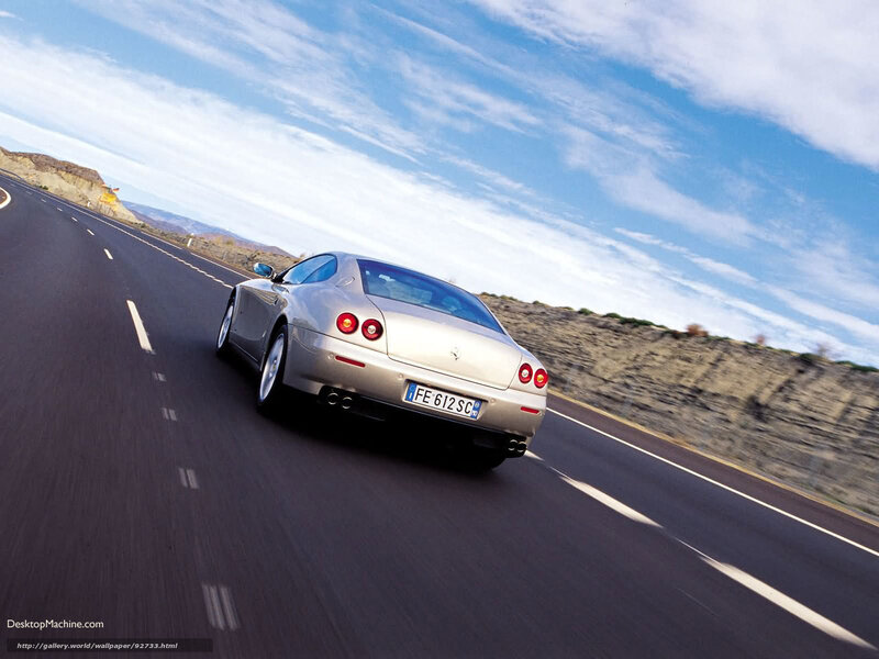 silver ferrari on desert road
