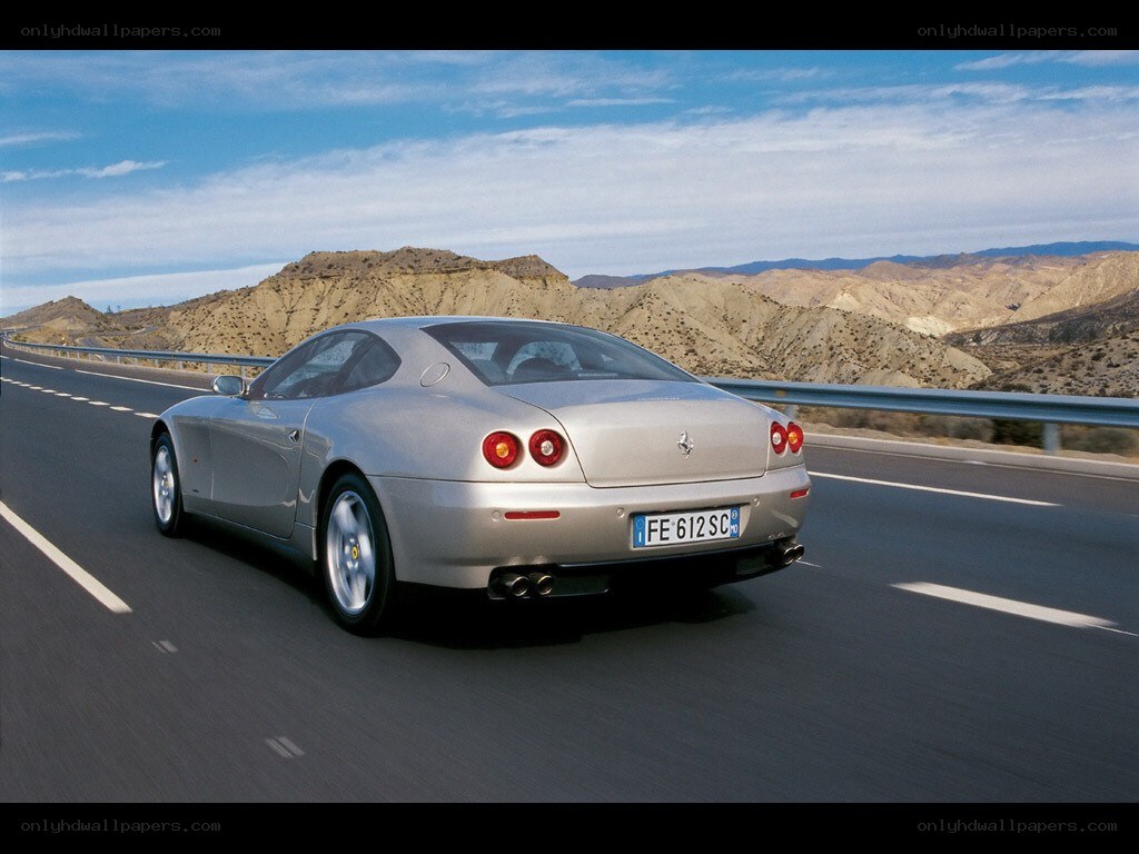 silver ferrari on highway