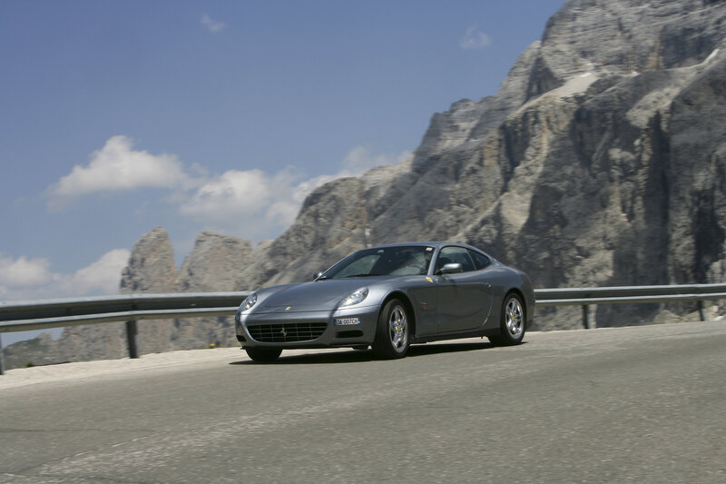 Silver Ferrari on mountain road