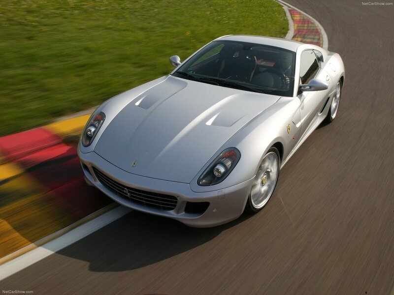 silver ferrari on racetrack