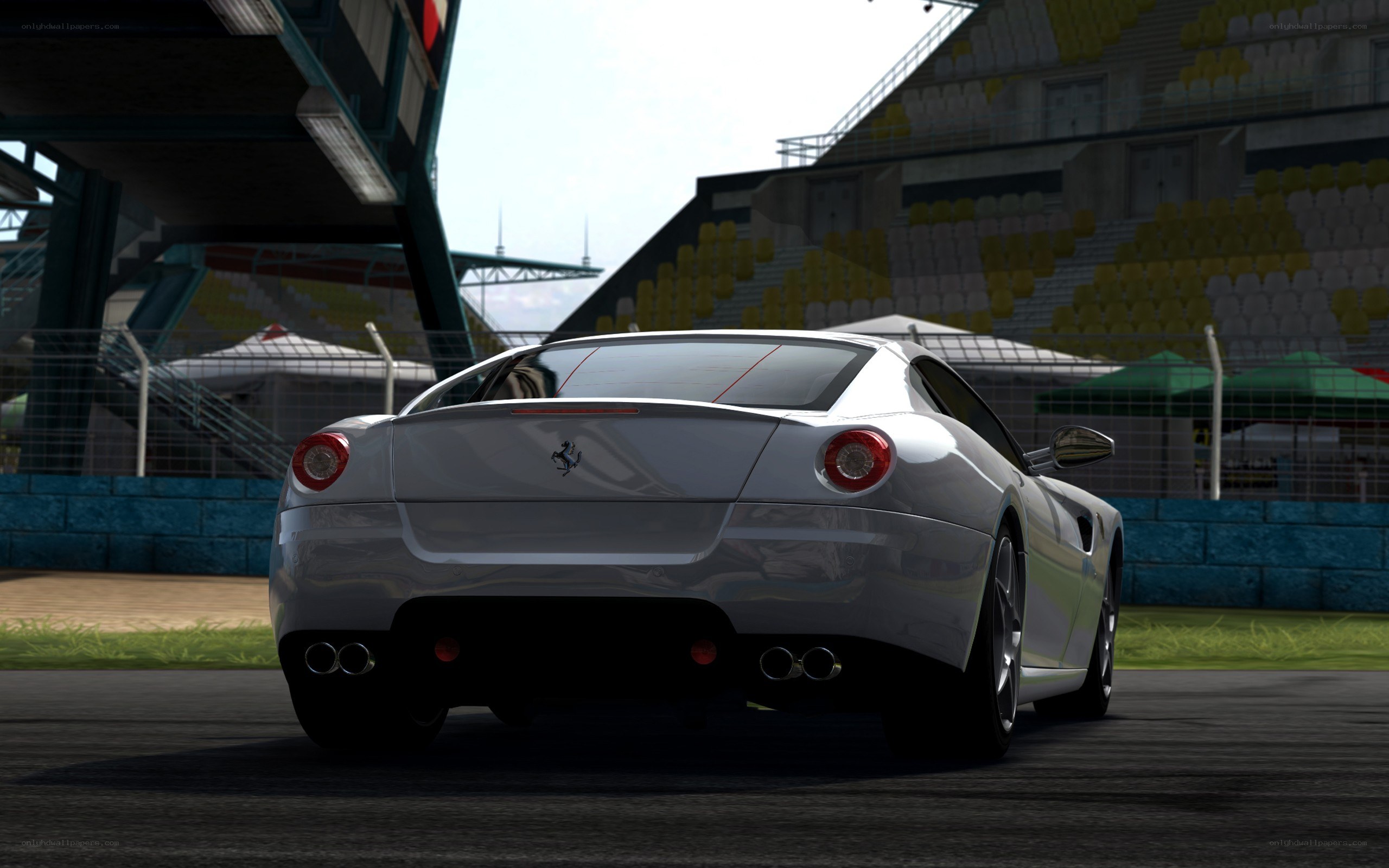 silver ferrari on racetrack