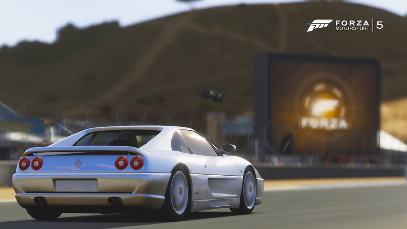 Silver Ferrari on Racetrack — White