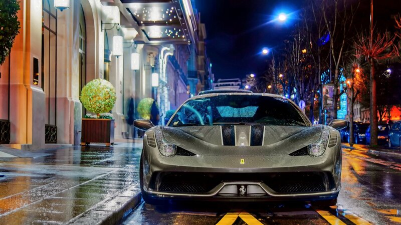 Silver Ferrari on Wet Street — Gray