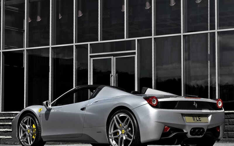 Silver Ferrari parked outside